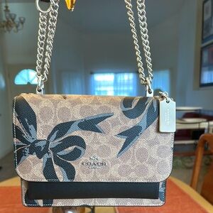 Coach Klare Tan and Black Crossbody Bag with Sleek Design